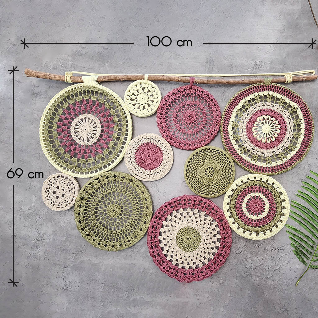 “Circles of Serenity” by ArtixHub – handwoven macramé wall hanging featuring concentric cotton loops on a driftwood rod, evoking organic texture and meditative flow. Ideal for living rooms, bedrooms, or reading nooks, this bohemian piece brings warmth and tranquility to UAE homes.