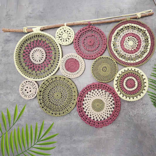 “Circles of Serenity” by ArtixHub – handwoven macramé wall hanging featuring concentric cotton loops on a driftwood rod, evoking organic texture and meditative flow. Ideal for living rooms, bedrooms, or reading nooks, this bohemian piece brings warmth and tranquility to UAE homes.