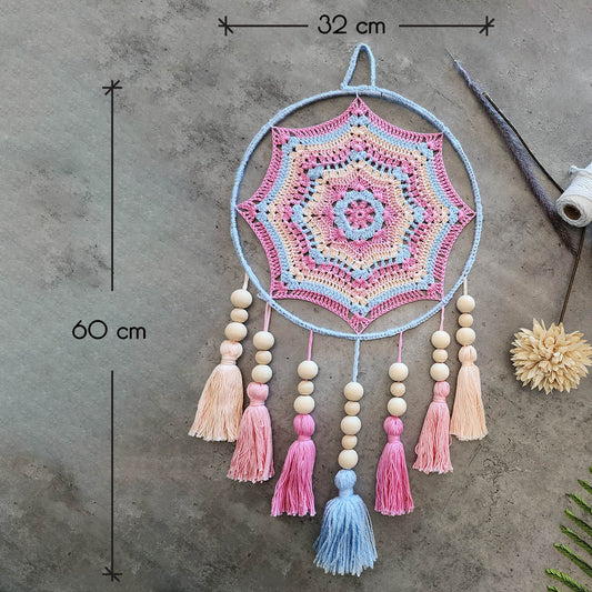 "Dreamscape" by ArtixHub – macramé wall hanging with pastel pink and blue tassels accented by natural wood beads, creating a playful cascade of color and texture. Ideal for nurseries, playrooms, or boho-inspired living spaces, adding whimsical charm to UAE interiors.