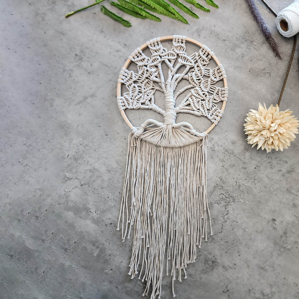 “Neutral Paradise” by ArtixHub – handwoven natural-cotton macramé tree silhouette wall art with delicate fringe and hoop frame, offering minimalist boho elegance. Ideal for modern bedrooms, hallways, or minimalist living spaces, adding serene texture to UAE décor.