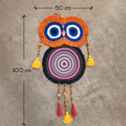 “Rainbow Owl Dreamer” by ArtixHub – colorful macramé owl wall hanging with orange, blue, and pink loops, wood beads, and tasseled feathers, capturing playful whimsy. Ideal for kids’ rooms, creative studios, or eclectic living spaces, infusing UAE interiors with joyful charm.