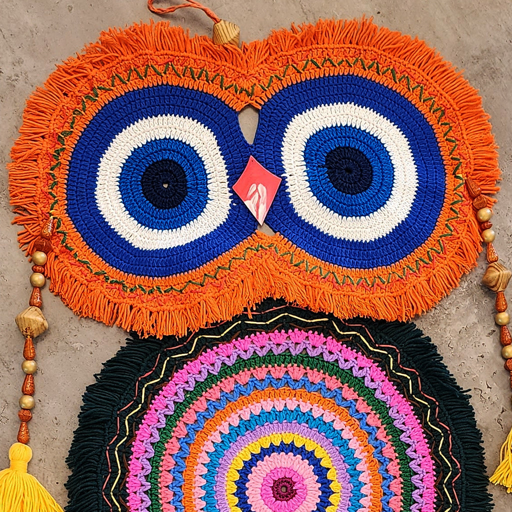 “Rainbow Owl Dreamer” by ArtixHub – colorful macramé owl wall hanging with orange, blue, and pink loops, wood beads, and tasseled feathers, capturing playful whimsy. Ideal for kids’ rooms, creative studios, or eclectic living spaces, infusing UAE interiors with joyful charm.