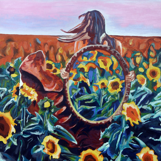 Colorful painting of a person with a large round mirror surrounded by sunflowers. Inside Out painting by Mira Ayyash showing a woman in a sunflower field holding a circular mirror that reflects more sunflowers in a surreal style