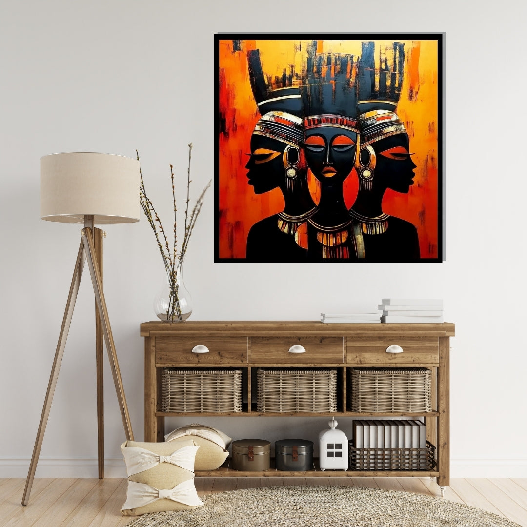 Artistic depiction of three faces with intricate headpieces on an orange and black background. The Trinity of Her – African abstract portrait of three women in harmony with tribal adornments by Amina Diallo