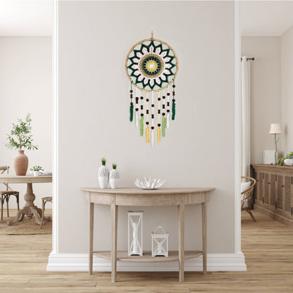 “Enchanting Greens Dreamcatcher” by ArtixHub – macramé dreamcatcher in moss, sage, and mint hues with wooden beads and curly tassels, evoking woodland tranquility. Ideal for bedrooms, reading corners, or boho-chic spaces, weaving nature’s calm into UAE interiors.