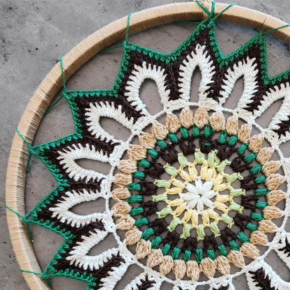 “Enchanting Greens Dreamcatcher” by ArtixHub – macramé dreamcatcher in moss, sage, and mint hues with wooden beads and curly tassels, evoking woodland tranquility. Ideal for bedrooms, reading corners, or boho-chic spaces, weaving nature’s calm into UAE interiors.