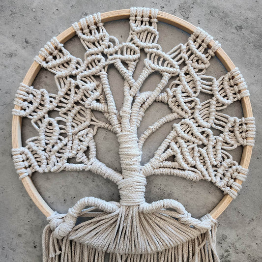 “Neutral Paradise” by ArtixHub – handwoven natural-cotton macramé tree silhouette wall art with delicate fringe and hoop frame, offering minimalist boho elegance. Ideal for modern bedrooms, hallways, or minimalist living spaces, adding serene texture to UAE décor.