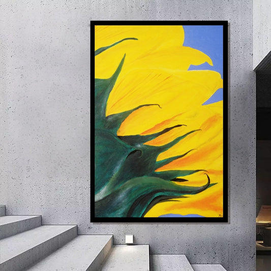 Close-up of a sunflower with bright yellow petals and green leaves against a blue background. Floral Wave – abstract sunflower close-up painting with bold yellow petals by Mira Ayyash