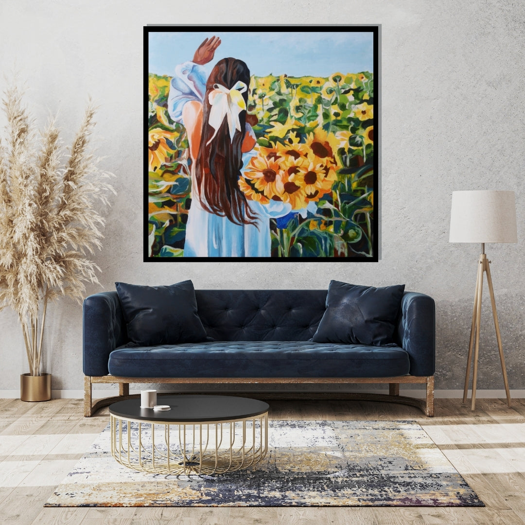 Painting of a woman in a blue dress with a white bow standing in a sunflower field. Painting of a girl with long brown hair tied with a white ribbon, holding a bouquet of sunflowers while standing in a sunflower field by Mira Ayyash